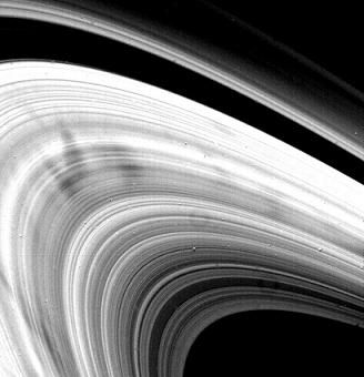 The spokes in Saturn's rings. Their appearance and disappearance depends on the angle formed by the plane of the rings with the Sun.
(Credits: NASA/JPL)