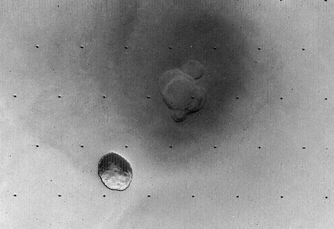 Eclipse of the Sun on Mars. The shadow of Phobos photographed by Viking Orbiter 2 on 23 June 1977 from a distance of 8000 km.
